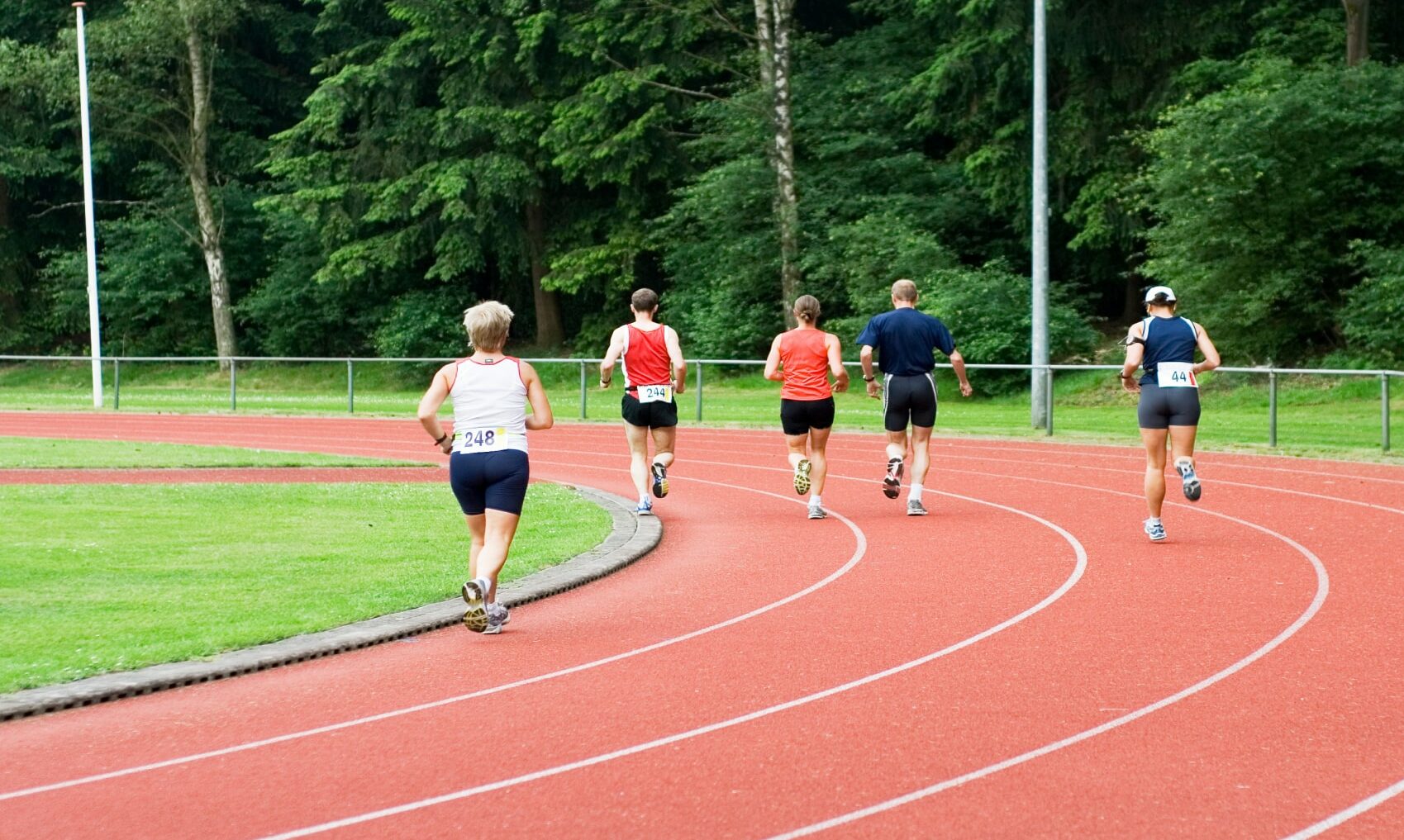 Runners running around a track.